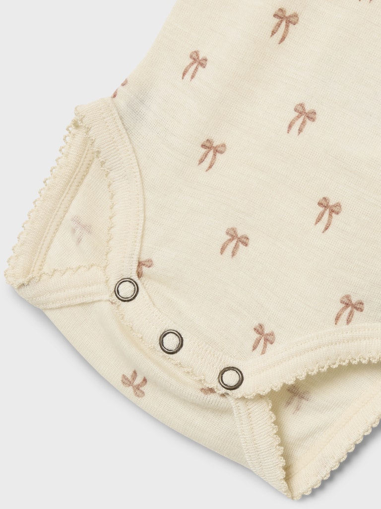 Lil Atelier | Romper Nalu wol strikjes
