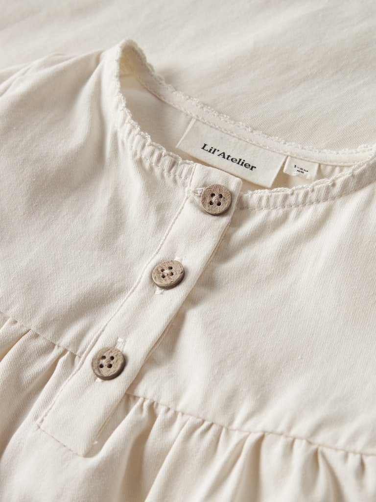 Lil Atelier | Baby truitje Lolia turtledove