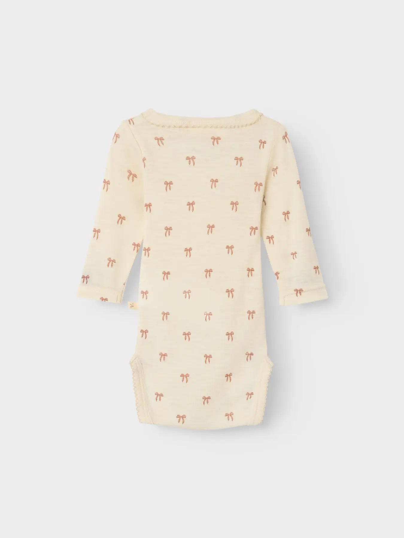Lil Atelier | Strampler mit Nalu-Wollschleifen 