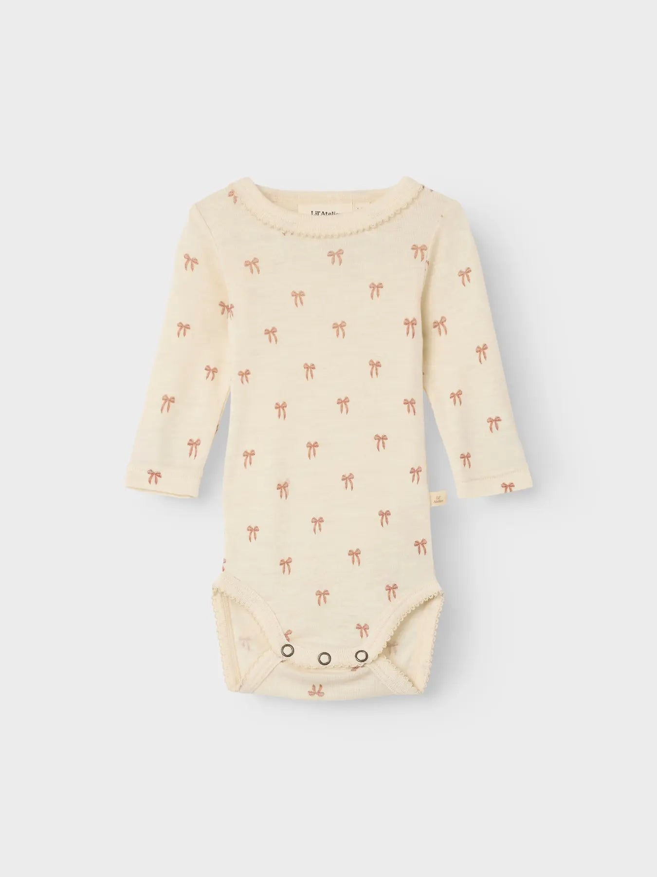 Lil Atelier | Strampler mit Nalu-Wollschleifen 