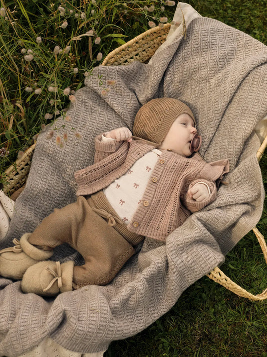 Lil Atelier | Romper Nalu wol strikjes