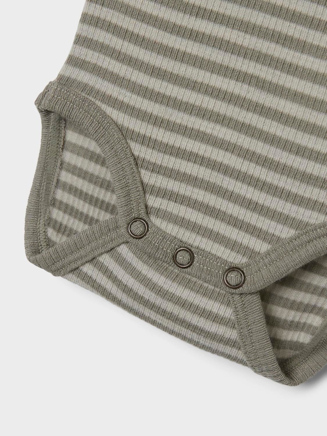 Lil Atelier | Wollstrampler Fable Fio grün/grau