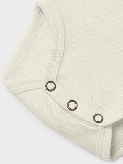 Lil Atelier | Romper wol Nalu durtledove